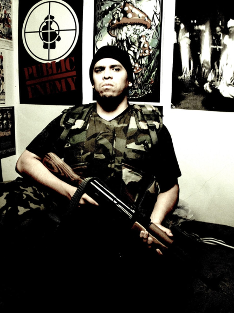 Immortal Technique booking photo for Halo Touring
